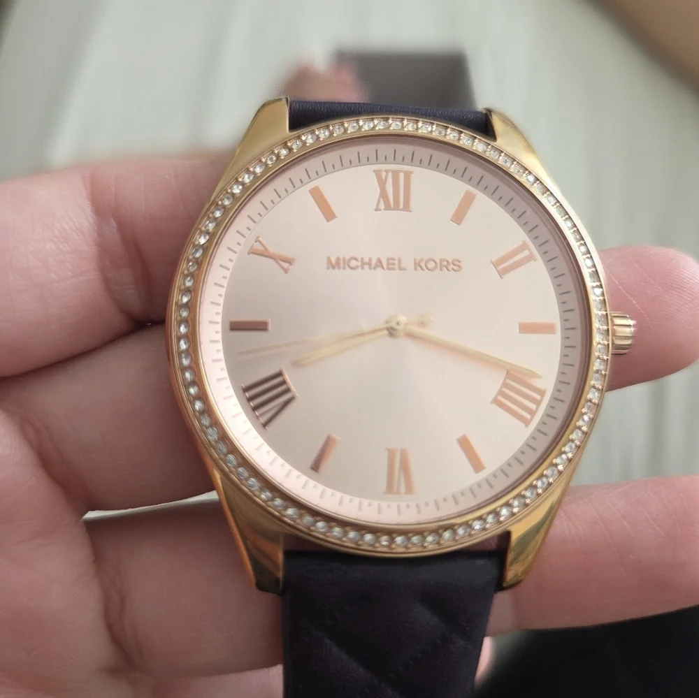 Michael Kors Rosegold Dial With A Quilted Plum Leather Strap